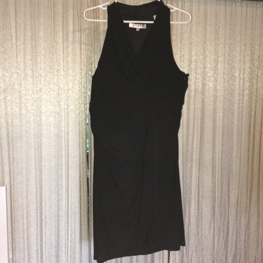 Very sexy form fitting black cocktail dress.